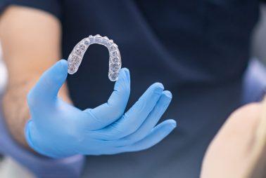 Dr. Siju George is a Certified Blue Diamond Invisalign provider in Muscat